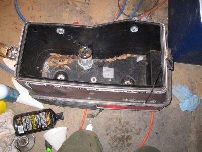 Left saddlebag.  It looks like some yokel installed some kind of air horn or something in there.
Keywords: 1984;goldwing;gl1200;saddle;bag;moron;idiot
