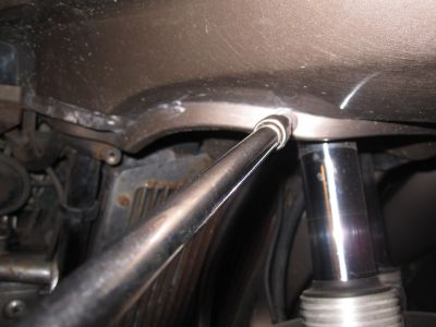 Removing main front fairing bolts.
Keywords: 1984;goldwing;gl1200