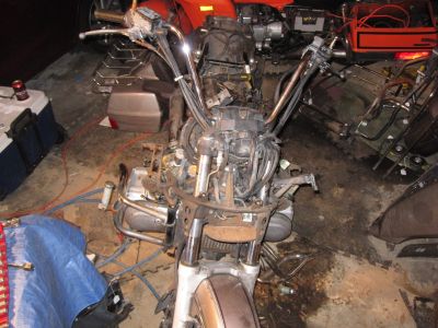Front faring removed.  All that remains of the bodywork is the metal fender over the rear wheel and the front fender.  The front fender is unbolted, but the wheel needs to come off in order to drop the bodywork.
Keywords: 1984;goldwing;gl1200