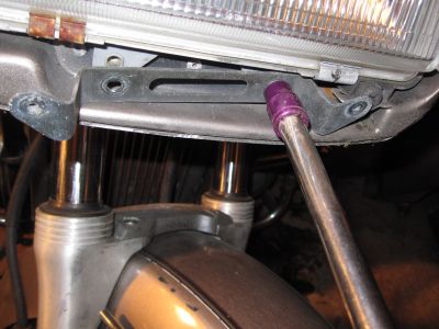 Removing the lower headlight bracket.
Keywords: 1984;goldwing;gl1200